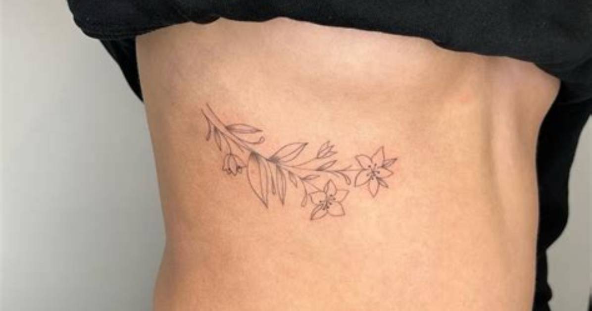 Enchanting Floral Rib Tattoos: a Symphony of Delicate Designs