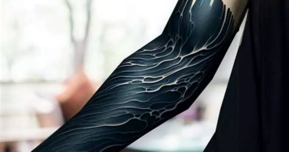 Exploring the Depths: the Meaning Behind Blackout Tattoos