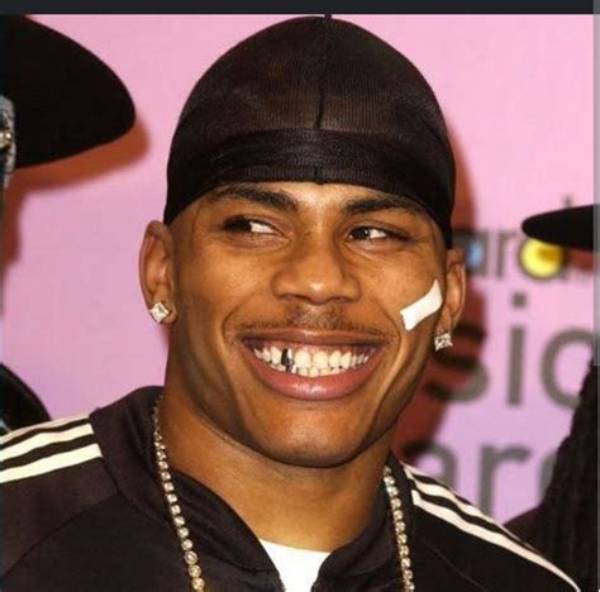 Nelly's Age in 2000: a Journey Through His Rise to Fame
