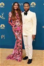 Pregnant Chrissy Teigen Shows off Bare Baby Bump in Cute Pj Set: ‘Dress for the Job You Want’