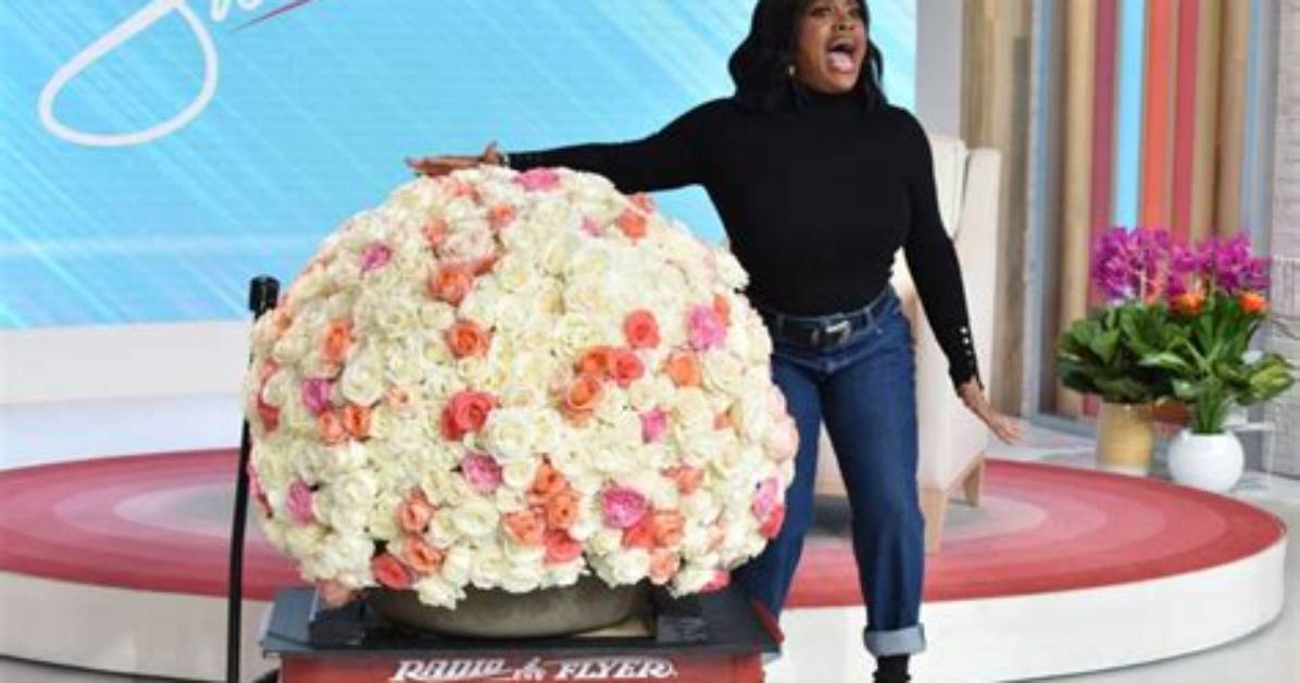 Sherri Shepherd Reveals Oprah Sent Her Huge Flower Arrangement, Reenacts Iconic Red Wagon Moment