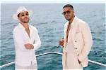 Unveil the Enchanting World of Romeo Santos and Laura Santos