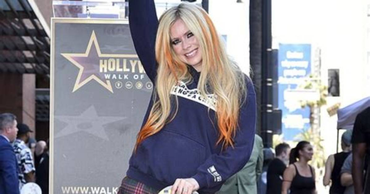 Unveiling the Height of Avril Lavigne: Just How Tall Is She?